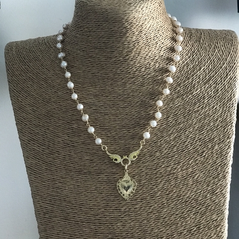 Collar corazón alas