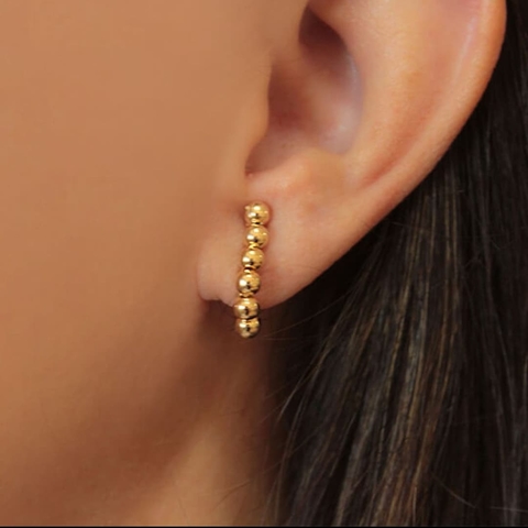 Brinco de pressão bolinhas