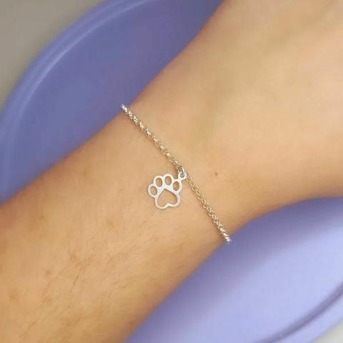 Pulseira com pingente de patinha