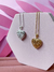 Relicário Love Dourado na internet