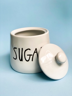 Açucareiro Be Happy na internet