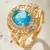Imagem do Anel Feminino de Luxo Vintage com Zircão Azul – Design Requintado e Exclusivo/ Cód. JA0019