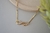 Pulseira Infinito com Borboleta Banho de Ouro 18k na internet