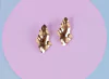 Aretes olas de oro