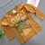Blusa em Malha Estampada Dino