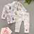 CONJUNTO CAMISETA ESTAMPADA EM MALHA COM CALÇA FLANELADA
