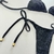 Biquíni Fio Dental Preto com Textura em Malha – Sensual e Sofisticado - comprar online