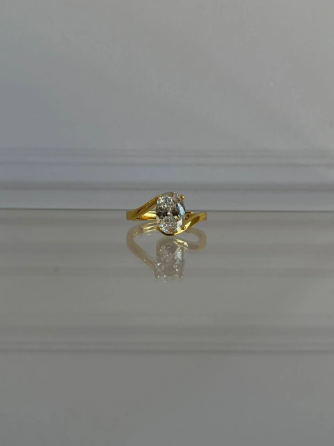 ANILLO AJUSTABLE ZIRCONIA OVALADA BANDA CRUZADA