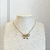 COLLAR CADENA DELGADA CON MOÑO