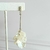 ARETES DE NOCHE LARGOS TIRA ZIRCONIAS Y PETALOS PERLA - comprar en línea