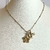 COLLAR CON BALINES DIJES COLIBRI Y FLOR