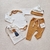 Ajuar Body Mostaza - comprar online