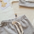 Ajuar Body Blanco - Gris - comprar online