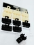 Broches con perlas mitad negro