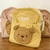 Mochila oso amarilla