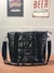 Bolso PUFFER PORTANOTEBOOK baston negro - tienda online