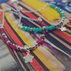 Pulsera con dije Estrellas rojo y negro