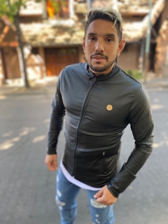 Campera Jogging manga Engomada negra - El Showroom de Ramos Mejia