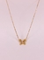Colar Borboleta em ouro rose com de diamantes brown e 1 safira branca - comprar online