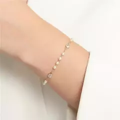 Pulseira Mini pérolas e ponto de luz - comprar online