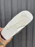 CHINELO NIKE ASSUNA 3.0 CINZA E LARANJA na internet