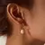 Aros perla bañado en oro con estrella - tienda online