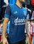 Camiseta alternativa de Racing Club 2014/15, color azul con detalles en blanco y azul claro.