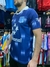 Camiseta "Multicanal" de Racing Retro, vista lateral, con diseño en tonos azules y el logo del equipo.