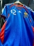 Camiseta retro de fútbol de Francia, modelo titular 2006, color azul con detalles en rojo, número 12 y logo de Adidas.