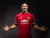Camiseta retro del Manchester United con el logo de Chevrolet y detalles en blanco.