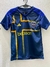 Camisa de fútbol del Club Atlético Boca Juniors, color azul marino con detalles en amarillo y el logo del club.