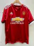 Camiseta retro del Manchester United de Zlatan Ibrahimovic, color rojo, con logo de Chevrolet y detalles en blanco.