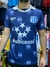 Camiseta retro de Racing Club, modelo "Multicanal", en color azul con detalles en blanco y logo de la marca Topper.