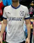 Camiseta suplente blanca de Independiente con detalles en azul y logo de Puma.