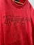 Remera roja de algodón con la palabra "Independiente" en letras negras.