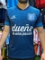 Camiseta alternativa de Racing Club 2014/15 en color azul con el logo del club y el lema "dueño de una pasión".