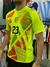 Camiseta amarilla flúor del "Dibu Martínez" con el número 23, diseñada con patrones geométricos y el logo de la AFA.