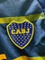 Escudo del Club Atlético Boca Juniors, con fondo azul y letras amarillas, adornado con estrellas.