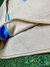 Buzo dorado para niño de Argentina, con detalles en azul y costuras visibles.