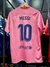 Camiseta retro suplente rosa del FC Barcelona con el nombre "Messi" y el número 10.