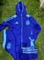 Conjunto de entrenamiento azul para niño, con chaqueta y pantalones, con el logo de la AFA y detalles en celeste.