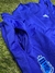 Conjunto deportivo azul para niño, compuesto por chaqueta y pantalón con detalles de la selección argentina.