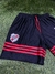 Shorts retro de River Plate de 1996, color negro con detalles en rojo y escudo del club.