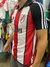 Camiseta retro de River Plate, tricolor con el número 10 de Ortega, vista lateral.
