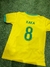 Camisa de fútbol amarilla con el nombre KAKA y el número 8 en la parte posterior.