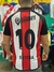 Camiseta retro de River Plate con el número 10 y el nombre Ortega, vista posterior.