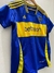 Camiseta de fútbol del club Boca Juniors, modelo titular, con colores azul y amarillo, sponsor Betsson.