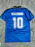 Camiseta retro de fútbol azul con el nombre "MARADONA" y el número "10" en la espalda.