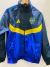 Rompeviento de Boca Juniors en tonos azul y amarillo, con logotipo y diseño característico del club.