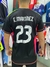Camiseta de la Selección Argentina con el nombre "E. Martínez" y el número 23, vista desde atrás.
